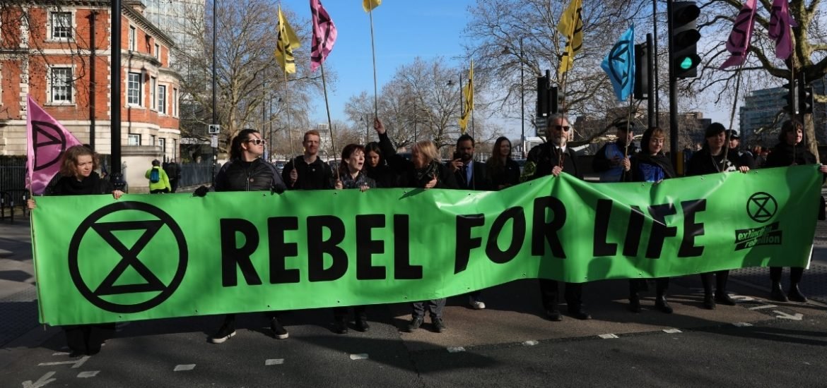 Climate change protestors disrupt London Fashion Week